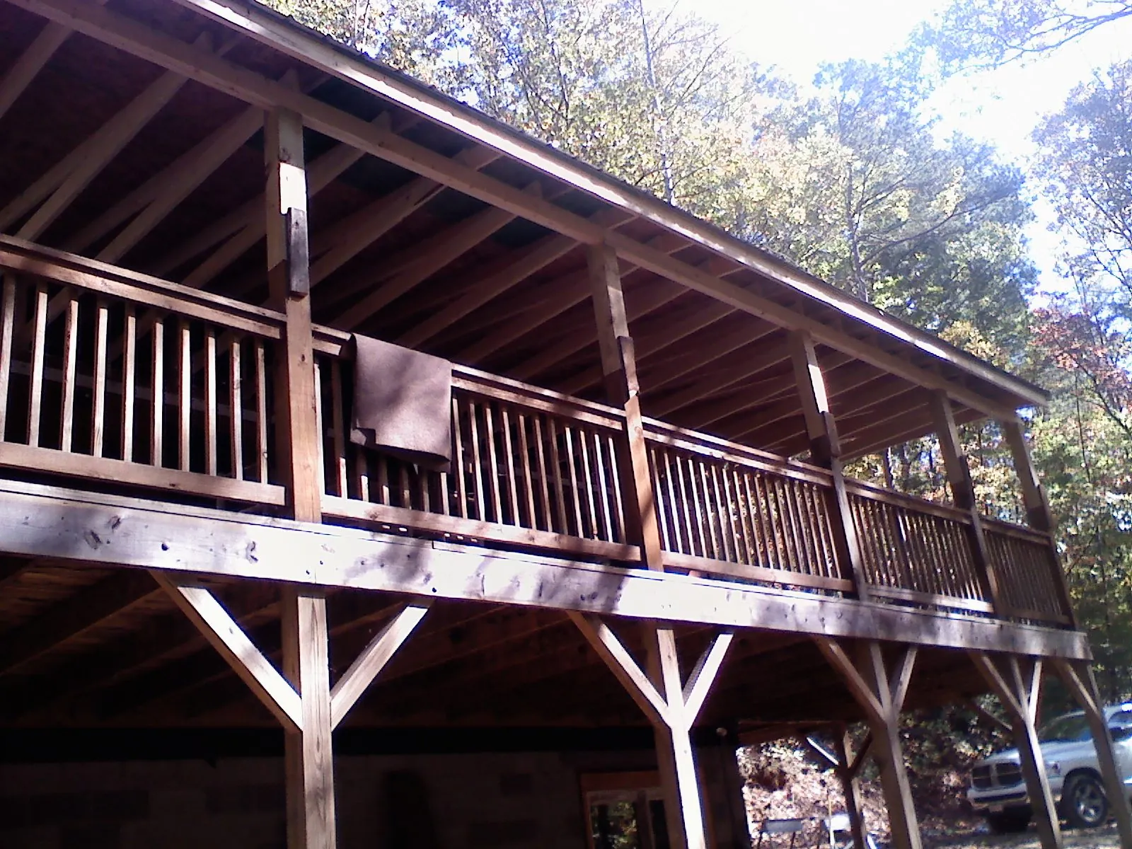 Timber framing under a new elevated porch and deck — Roof Leak Repair in North Haven by Roofing Brothers